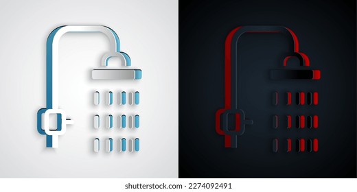 Paper cut Shower head with water drops flowing icon isolated on grey and black background. Paper art style. Vector