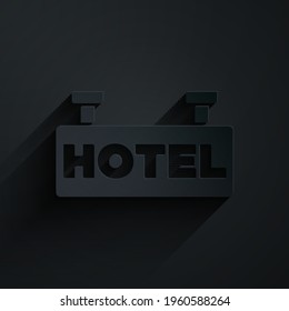 Paper cut Signboard outdoor advertising with text Hotel icon isolated on black background. Paper art style. Vector