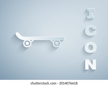 Paper cut Skateboard icon isolated on grey background. Extreme sport. Sport equipment. Paper art style. Vector