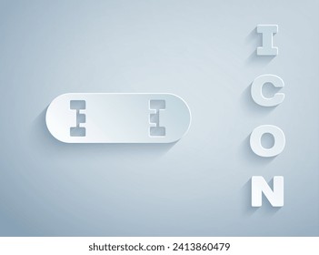 Paper cut Skateboard trick icon isolated on grey background. Extreme sport. Sport equipment. Paper art style. Vector Illustration