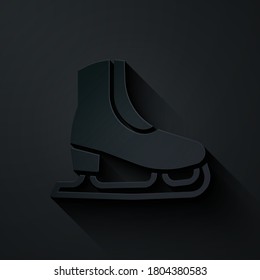 Paper cut Skates icon isolated on black background. Ice skate shoes icon. Sport boots with blades. Paper art style. Vector.