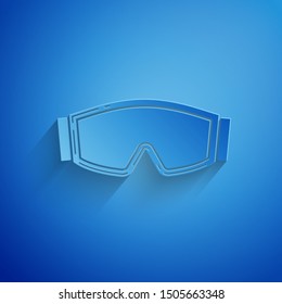 Paper cut Ski goggles icon isolated on blue background. Extreme sport. Sport equipment. Paper art style. Vector Illustration