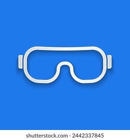 Paper cut Ski goggles icon isolated on blue background. Extreme sport. Sport equipment. Paper art style. Vector