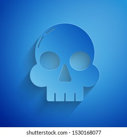 Paper cut Skull icon isolated on blue background. Happy Halloween party. Paper art style. Vector Illustration