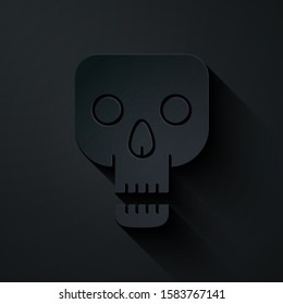 Paper cut Skull icon isolated on black background. Happy Halloween party. Paper art style. Vector Illustration