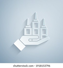 Paper cut Skyscraper icon isolated on grey background. Metropolis architecture panoramic landscape. Paper art style. Vector.
