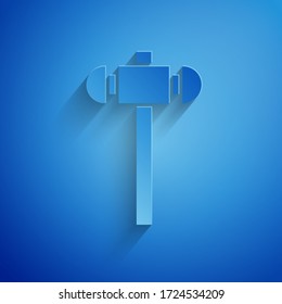 Paper cut Sledgehammer icon isolated on blue background. Paper art style. Vector Illustration