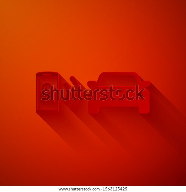 Paper cut Smart car alarm\
system icon isolated on red background. The smartphone controls the\
car security on the wireless. Paper art style. Vector\
Illustration