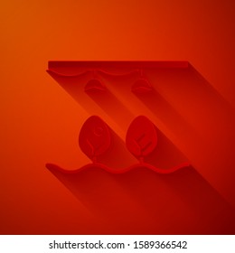 Paper cut Smart farm with light bulb and plant symbol icon isolated on red background. Paper art style. Vector Illustration