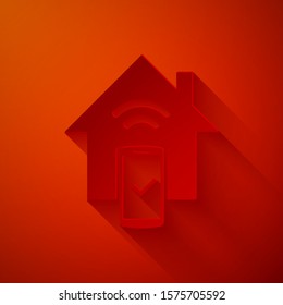 Paper cut Smart home - remote control system icon isolated on red background. Paper art style. Vector Illustration