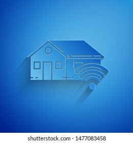 Paper cut Smart home with wi-fi icon isolated on blue background. Remote control. Paper art style. Vector Illustration
