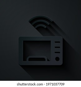 Paper cut Smart microwave oven system icon isolated on black background. Home appliances icon. Internet of things concept with wireless connection. Paper art style. Vector