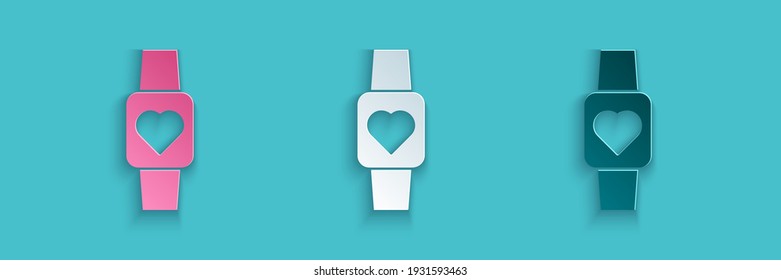 Paper cut Smart watch showing heart beat rate icon isolated on blue background. Fitness App concept. Paper art style. Vector