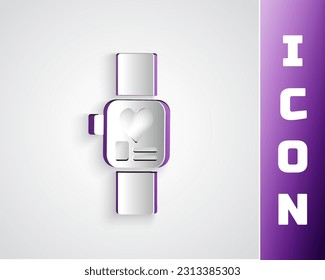 Paper cut Smart watch showing heart beat rate icon isolated on grey background. Fitness App concept. Paper art style. Vector