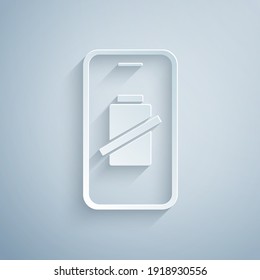 Paper cut Smartphone battery charge icon isolated on grey background. Phone with a low battery charge. Paper art style. Vector.
