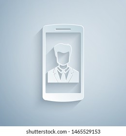 Paper cut Smartphone with contact on screen icon isolated on grey background. Incoming call. Human on phone screen. Call contact. Paper art style. Vector Illustration Paper cut Smartphone with contact on screen icon isolated on grey background. Incoming call. Human on phone screen. Call contact. Paper art style. Vector Illustration