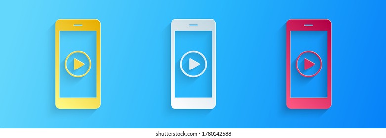 Paper cut Smartphone with play button on the screen icon isolated on blue background. Paper art style. Vector