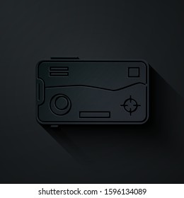 Paper cut Smartphone and playing in game icon isolated on black background. Mobile gaming concept. Paper art style. Vector Illustration