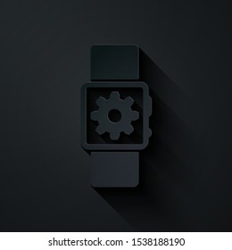 Paper cut Smartwatch setting icon isolated on black background. Smart watch settings. Paper art style. Vector Illustration