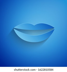 Paper cut Smiling lips icon isolated on blue background. Smile symbol. Paper art style. Vector Illustration
