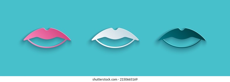 Paper cut Smiling lips icon isolated on blue background. Smile symbol. Paper art style. Vector