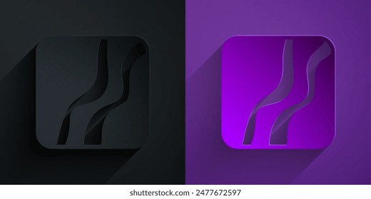 Paper cut Snake paw footprint icon isolated on black on purple background. Paper art style. Vector