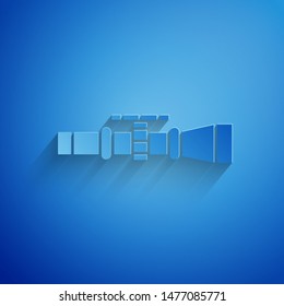Paper cut Sniper optical sight icon isolated on blue background. Sniper scope crosshairs. Paper art style. Vector Illustration