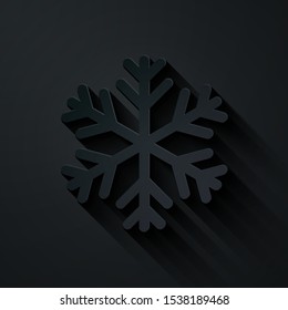 Paper cut Snowflake icon isolated on black background. Paper art style. Vector Illustration