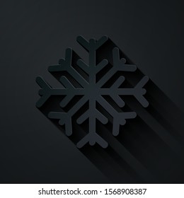 Paper cut Snowflake icon isolated on black background. Paper art style. Vector Illustration