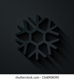 Paper cut Snowflake icon isolated on black background. Paper art style. Vector Illustration