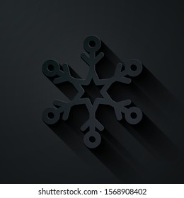 Paper cut Snowflake icon isolated on black background. Paper art style. Vector Illustration