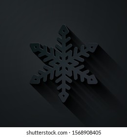 Paper cut Snowflake icon isolated on black background. Paper art style. Vector Illustration