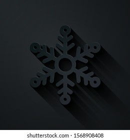 Paper cut Snowflake icon isolated on black background. Paper art style. Vector Illustration