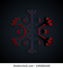 Paper cut Snowflake icon isolated on black background. Paper art style. Vector Illustration