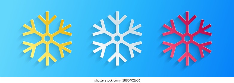 Paper cut Snowflake icon isolated on blue background. Paper art style. Vector.