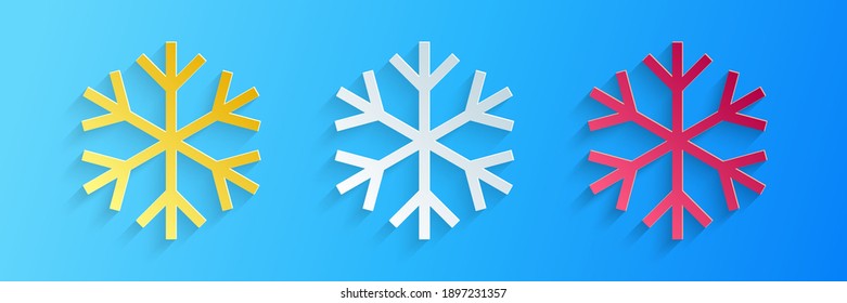 Paper cut Snowflake icon isolated on blue background. Paper art style. Vector.