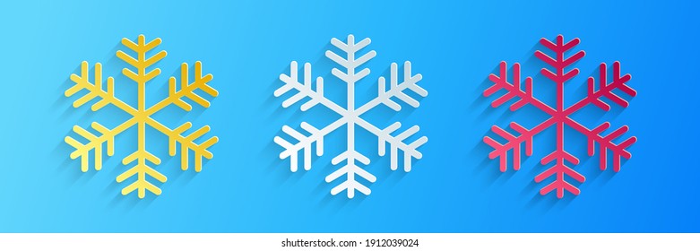 Icono de copo de nieve cortado con papel aislado en fondo azul. Estilo de arte de papel. Vector.