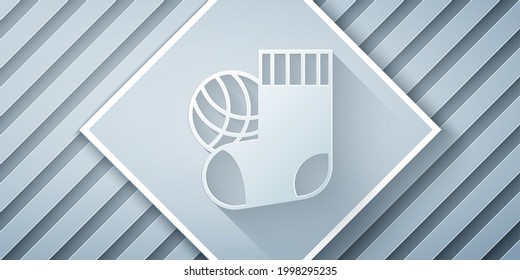 Paper cut Socks icon isolated on grey background. Paper art style. Vector