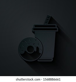 Paper cut Soda drink with drinking straw and donut icon isolated on black background. Fast food symbol. Paper art style. Vector Illustration