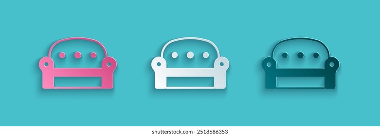 Paper cut Sofa icon isolated on blue background. Paper art style. Vector