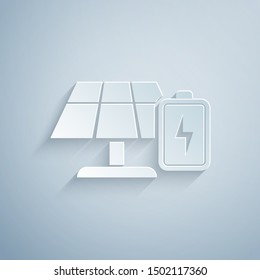 Paper cut Solar energy panel and battery icon isolated on grey background. Paper art style. Vector Illustration