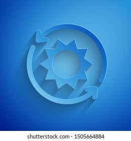 Paper cut Solar energy panel icon isolated on blue background. Sun with lightning symbol. Paper art style. Vector Illustration