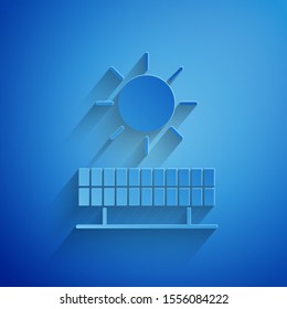 Paper cut Solar energy panel and sun icon isolated on blue background. Paper art style. Vector Illustration