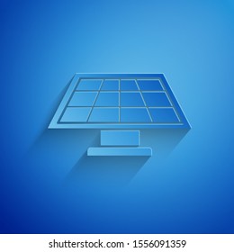 Paper cut Solar energy panel icon isolated on blue background. Paper art style. Vector Illustration