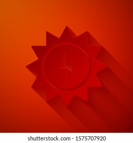 Paper cut Solar energy panel icon isolated on red background. Sun with lightning symbol. Paper art style. Vector Illustration