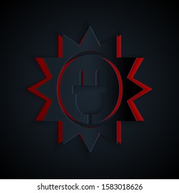 Paper cut Solar energy panel icon isolated on black background. Sun and electric plug. Paper art style. Vector Illustration
