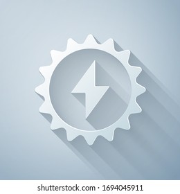 Paper cut Solar energy panel icon isolated on grey background. Sun with lightning symbol. Paper art style. Vector Illustration