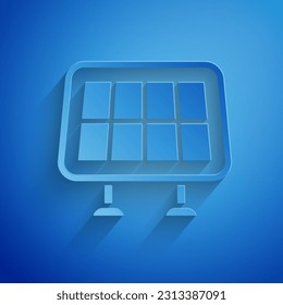 Paper cut Solar energy panel icon isolated on blue background. Paper art style. Vector