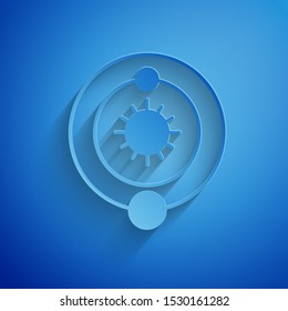 Paper cut Solar system icon isolated on blue background. The planets revolve around the star. Paper art style. Vector Illustration