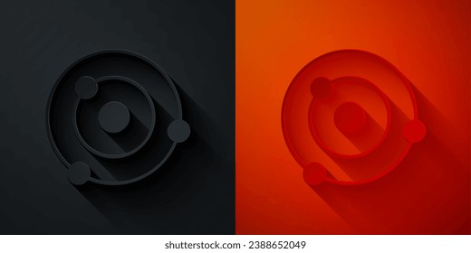 Paper cut Solar system icon isolated on black and red background. The planets revolve around the star. Paper art style. Vector